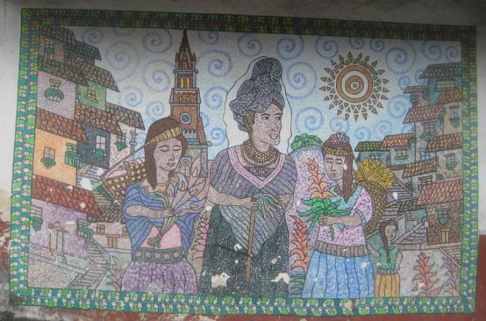 A mural in Cuetzalan, Puebla, depicting the life of abundance that Tosepan seeks to uphold. Photo by Alex Jensen.