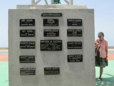 Among the North Americans Cuba pays tribute to are Frederick Douglass, <a data-cke-saved-href="http://socialwelfare.library.vcu.edu/settlement-houses/addams-jane/" href="http://socialwelfare.library.vcu.edu/settlement-houses/addams-jane/" target="_blank">Jane Addams</a> and Martin Luther King. Dorien DeLuc poses with the monument.