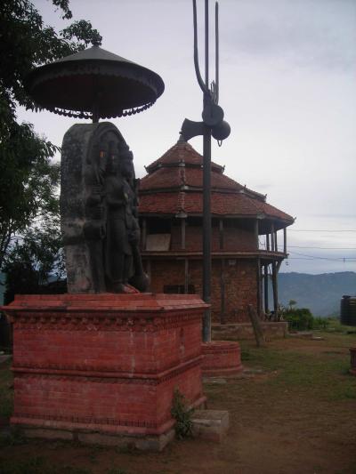 Hanuman shrine, Trisul, and Kali Baba's "<em>kuti</em>." Mahankal, Nepal.