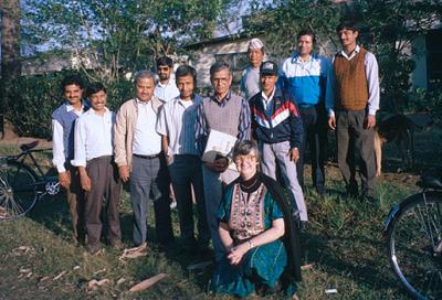 Elinor Ostrom with members of the Irrigation Management Systems Study Group. Nepal, 1993. Photo via Arizona State University.