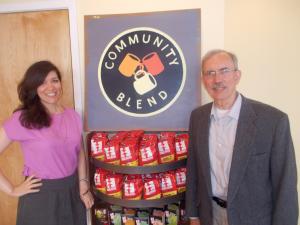 Esther and Ray West standing at the fair trade coffee shop in Cincinnati with Equal Exchange co-op coffee.