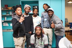 Tightshift member apprentices and supporters at Tightshift Laboring Cooperative’s launch in December 2016 at Impact Hub DC. Adriel Fogle, Delonte Wilkins, Noreil Gorham, Donnell Sims, Keith Gaffney, Nicholas Gorham (bottom row). Photo by Samira Rashid, <a href="http://www.srashid.com/" target="_blank">SR Photography</a>.