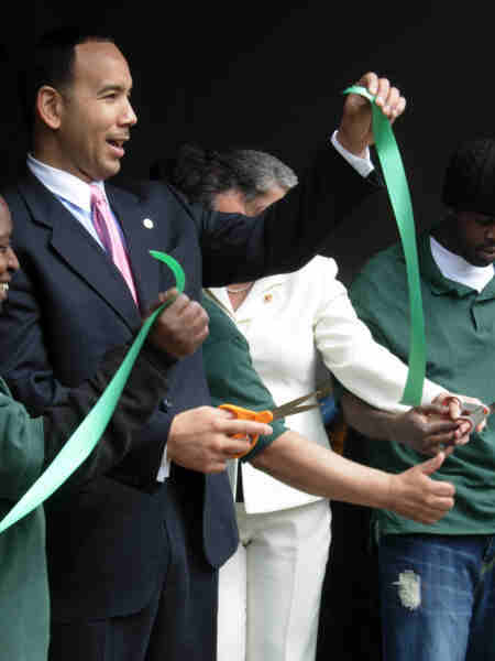 Cutting the ribbon at Rebuilder's Source