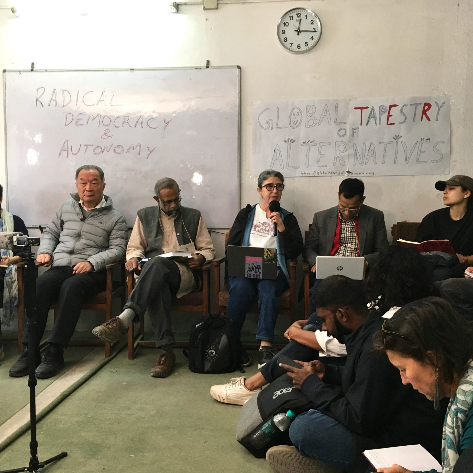 Speakers from India, China and North East Syria (Rojava) in the session on radical democracy and autonomy