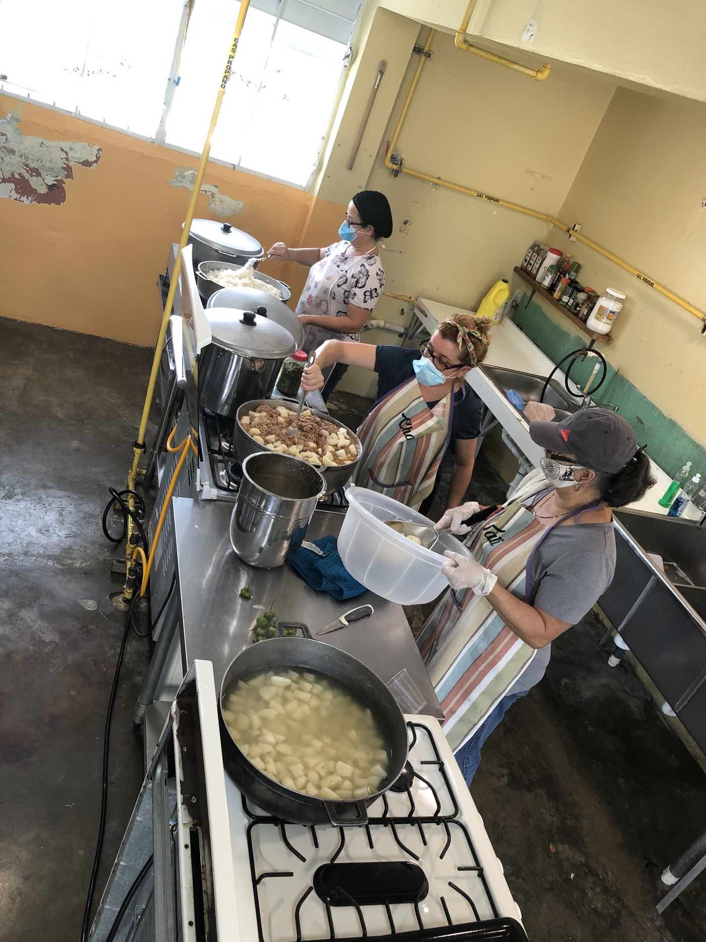 People working together in a mutual aid center.