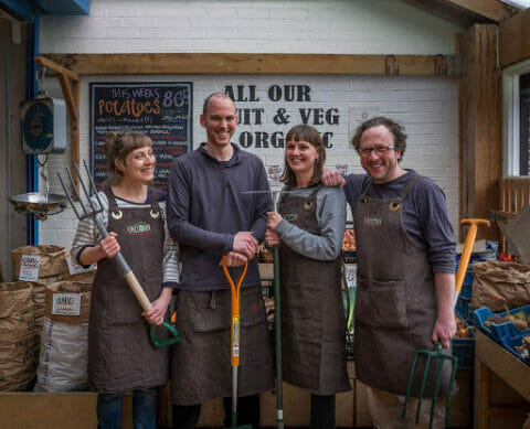 Four Unicorn Grocery worker-owners.