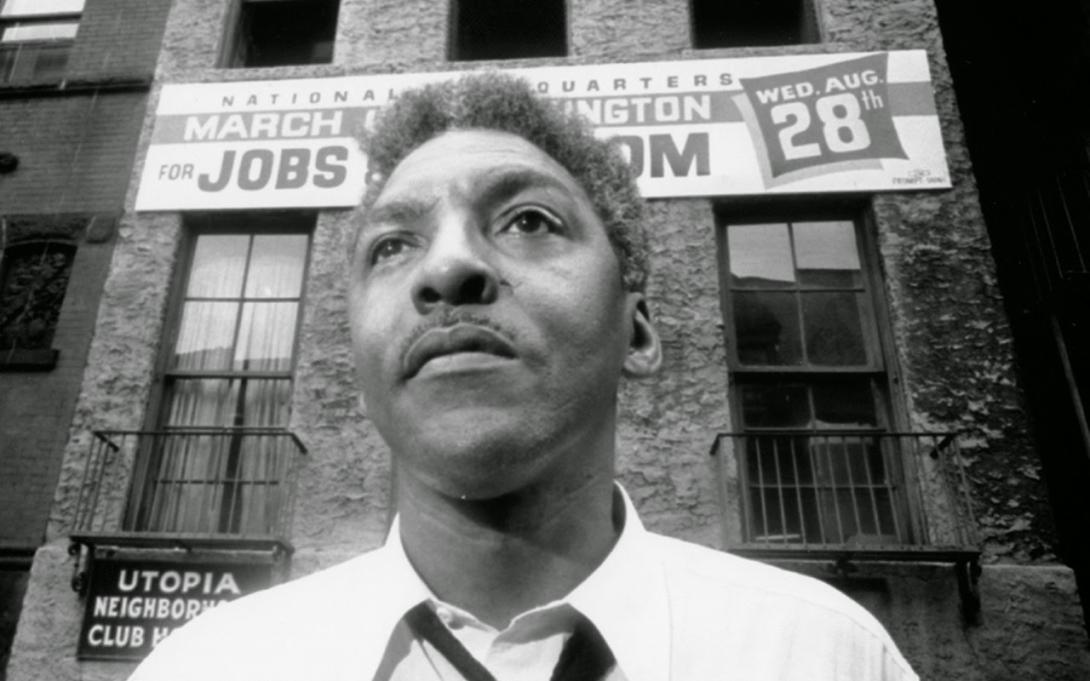 Bayard Rustin outside the headquarters of the March on Washington.