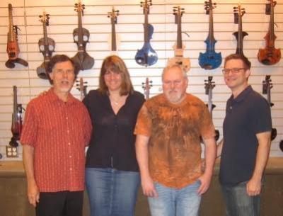 Blaise Kielar (far left) and the new Electric Violin Shop ownership team