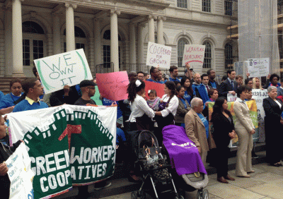 Co-op supporters rally in New York. Photo via EcoMundo Co-op